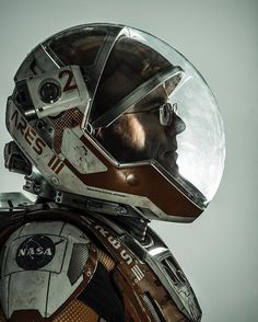 a man wearing a space suit and helmet