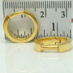 12 gauge hoop earrings for men. Handmade from solid high quality 925 sterling silver and plated in yellow gold. Sold as a pair or single earring. Specification Base metal: 925 sterling silver Outer plating: yellow gold Measurements are an approximation as these are individually handmade Outer diameter: between 15mm- 17mm Inner diameter: between 10mm to 13mm Size L Width: 3.5mm Ear post gauge: 12G Link to customize ear post gauge https://www.etsy.com/listing/245008458 More gauged earrings https:/ Classic Small Hoop Internally Threaded Jewelry, Adjustable Small Hoop Earrings, Conch Earrings, Hoop Earrings For Men, Gauge Earrings, Earrings Gold Hoop, Mens Earrings Hoop, Conch Earring, Earrings For Men