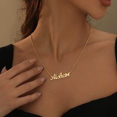 Dress your little ones with a nameplate necklace! Customize this necklace with a name or a meaningful word. Crafted from 18K gold and silver plating, this piece is durable and made to last. Details: Personalize With: Names, Numbers, or Words. Pendant Size varies by name (3.5cm-5cm) Matching Link Chain Closure: Lobster Clasp Custom Gold Necklace Name, Name Chains Necklace Gold, Name Chain Gold, Name Necklace Aesthetic, Name Plate Chain, Gold Necklace With Name, Name Pendant Gold, Name Gold Necklace, Necklace Name Design