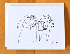 a drawing of a cat and a man standing next to each other on top of a wooden table