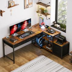 a computer desk with two monitors on it