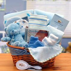 a basket filled with baby items on top of a table