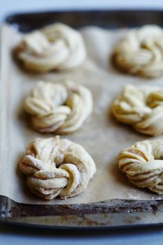 the doughnuts are ready to be baked in the oven