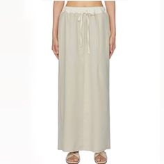 From Codibook. Poterna Korean Brand. Has Pockets. One Size But Would Fit An Xs-Small Best. Waist Lying Flat Is 11.5” But Is Stretchy With A Drawstring Waist. 37” Long. Asian Fashion, Zara, Revolve, H&M, Urban Outfitters, Free People, Princess Polly Casual Beige Skirt For Daywear, Waist-length Bottoms For Summer Daywear, Waist-length Skirt For Summer Daywear, Summer Daywear Waist-length Skirt, Waist-length Summer Skirt For Daywear, Casual Beige Maxi Skirt For Vacation, Casual Beige Maxi Skirt For Day Out, Waist-length Skirt For Beach In Spring, Beige Non-stretch Maxi Skirt For Spring