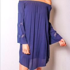 Navy Blue Off The Shoulder Dress Spring Blue Off-shoulder Mini Dress, Spring Bohemian Royal Blue Dress, Blue Flowy Mini Dress For Fall, Blue Fall Vacation Dress, Casual Royal Blue Mini Dress For Summer, Navy Flowy Summer Dress, Flowy Navy Summer Dress, Navy Flowy Dress For Spring, Casual Royal Blue Mini Dress For Spring