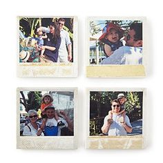 four polaroid photos of people taking pictures with their cell phones and one is holding a baby