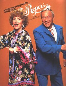 an older man and woman are posing for the camera in front of a magazine cover