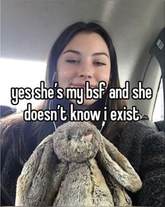 a woman holding a stuffed animal in her lap with the caption yes she's my bsf and she doesn't know i exit