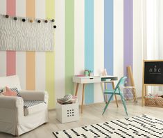 a child's room with striped walls and furniture