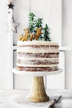 a cake with frosting and decorations on top