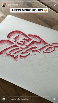 an image of a drawing on paper with the words, i love you in red ink