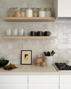 the kitchen counter is clean and ready to be used for cooking or baking, as well as other items