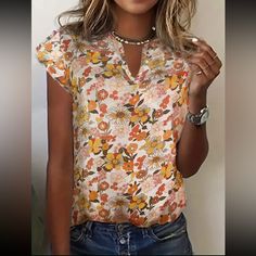 Floral Print Notch Neck Blouse, Casual Ruffle Trim Sleeveless Blouse For Spring & Summer, Women's Clothing Boutique Sizes Available In Lettering: S (4) M (6) L (8/10) Xl (12) Xxl (14) !!*Please Note*!! *This Is A Pre-Order Item And Requires A Longer Shipping Time. Please Allow 7-14 Business Days Before Shipping.* Thank You For Your Patience. Once Ordered Is Placed We Will Notify You Of An Expected Shipping Date. Bundle 2 Or More Items From My Closet For A 15% Discount. Tags: Spring Summer Fall W Summer Orange V-neck Blouse, Summer Printed Orange Blouse, Chic Sleeveless Orange Top, Chic Orange Sleeveless Top, Chic Apricot Short Sleeve Tops, Orange Short Sleeve Blouse For Spring, Orange V-neck Summer Blouse, Summer Orange Printed Blouse, Chic Apricot Sleeveless Top