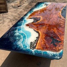 a table that has been made to look like it is painted with blue and orange