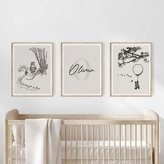 three black and white pictures hang on the wall above a crib