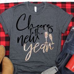 a t - shirt that says cheers to the new year with glitter heels on it