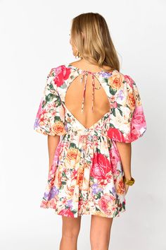 This pretty floral dress will remind you of a romantic summer garden - sweetheart neckline with puff sleeves and an open tie back make this a stunning dress for any occasion. Fit: The Bonnie Dress fits true to size. Length: Hits right above the knee Bust: Accommodates most bust sizes . Waist: Relaxed fit Hips: Relaxed fit Fabric: Fabric contains no stretch Summer Floral Print Dress With Sweetheart Neckline, Summer Dresses With Floral Print And Sweetheart Neckline, Summer Dresses With Sweetheart Neckline And Floral Print, Garden Party Dress With Smocked Back And Sweetheart Neckline, Garden Party Dress With Sweetheart Neckline And Smocked Back, Flowy Puff Sleeve Dress For Garden Party, Spring Garden Party Puff Sleeve Dress With Smocked Back, Flowy Floral Print Puff Sleeve Dress For Garden Party, Flowy Mini Dress With Floral Print And Puff Sleeves