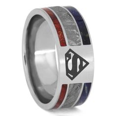 a wedding ring with an arrow and red, white, and blue wood inlay