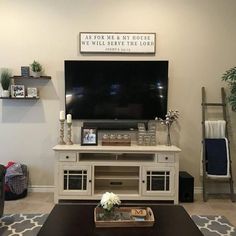 a living room with a large flat screen tv