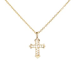 Introducing the Evelyn Cross Necklace, a piece where classic faith meets modern elegance. Adorned with sparkling cubic zirconia stones that catch the light with every turn, this necklace is a testament to timeless devotion and contemporary style. The delicate gold chain holds the cross pendant gracefully, making it a subtle yet striking addition to any ensemble. Whether as a personal symbol of faith or a gift of spiritual significance, the Evelyn Cross Necklace is sure to be cherished.  Hypoallergenic, nickel, and lead-free; Tarnish resistant. Made of 14K gold over sterling silver. High-grade Cubic Zirconia stones. Elegant Pendant Cross Necklace With Clavicle Chain, Elegant Cross Pendant Necklace With Clavicle Chain, Elegant Pendant Cross Necklace With Adjustable Chain, Elegant Diamond Cut Cross Necklace In Diamond White, Elegant Diamond White Cross Necklace With Diamond Accents, Elegant Necklace With Diamond Accents And Cross Pendant, Elegant Cross Pendant Necklace With Diamond Accents, Elegant Sterling Silver Cross Necklace, Elegant White Cross Necklace With Adjustable Chain