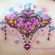 the back of a woman's stomach with hearts and angel wings on her chest