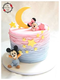 there is a cake that looks like mickey and minnie mouse