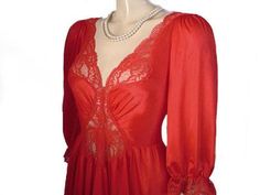 "EASY LAYAWAY IS AVAILABLE You will look gorgeous in this fabulous rare vintage Olga nightgown with hard-to-find sleeves in Chili Pepper. Beautiful color in a deep red. Perfect for all year around. Lovely feminine spandex scalloped lace on the bodice which travels over shoulders and continues in back for a lovely look. Large sheer spandex insert in center of bodice. 3/4 sleeves are perfect for cooler months or the summer months when the a/c is running. Wide 2\" intricate lace trimmed elastic sle Red Coquettish Sleepwear With Lace Trim, Vintage Long Sleeve Cotton Nightgown, Vintage Cotton Long Sleeve Nightgown, Red Lace Trim Nightgown, Olga Nightgown Vintage, Lace Nightgown, Vintage Nightgown, Women's Nightgowns, Scalloped Lace