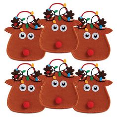 six reindeer head shaped christmas decorations with red noses and brown nosebands on white background