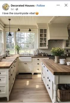 a kitchen with lots of counter space and white cupboards on the walls, along with wooden flooring