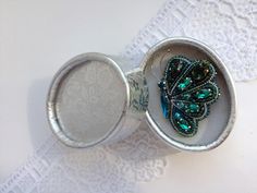 "Woodlander jewelry emerald butterfly it is embroidered brooch from different crystals, and silver gimp. Silver insect brooch has a natural butterfly size - 1.6*1.2 inches (4*3 cm). This embroidered brooch butterfly pin is a great option is to decorate a cardigan, jacket, coat or half-coat. Luxurious, exquisite embroidery art - beaded insect brooch with crystals. The silver emerald butterfly will perfectly complement your unique insect jewelry collection or will be a wonderful gift to a very spe Silver Butterfly Brooch For Party, Handmade Elegant Butterfly Brooches, Elegant Handmade Butterfly Brooches, Silver Beaded Brooches As Gifts, Emerald Butterfly, Sweater Brooch, Insect Brooch, Spider Jewelry, Jewelry Emerald