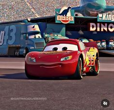 the cars from disney pixars are driving in front of a stadium