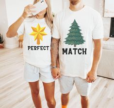 Are you looking for a funny Christmas shirt set for couples? This beautiful t-shirt set, with a trendy design, is meant to bring some fun into your life every time you will wear these tees, on Christmas eve and beyond. If you know a couple who would love to wear these trendy matching shirts for Christmas, this would make a great gift for them.  Check out more unique and funny designs in our shop, including more matching couple shirts: https://www.etsy.com/shop/AllTheHappyDesigns?ref=seller-platf Christmas Shirts Funny, Shirts For Couples, Matching Christmas Shirts, Create Picture, Matching Couple Shirts, Matching Couple, Funny Christmas Shirts, Couple Matching, Shirts Funny