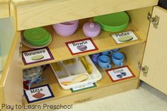 a wooden shelf filled with lots of different items