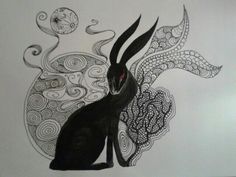 a drawing of a black rabbit sitting on top of a table