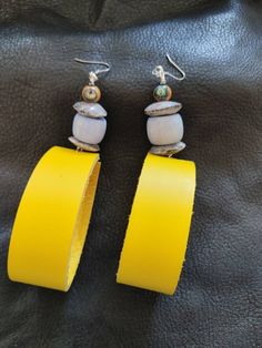 This listing is for a funky pair of bright leather earrings... They are big and bold and feature kenyan bone disks abalone inlay papaya wood beads And blue kenyan bone drums Afro Jewelry, Natural Hair Art, Hair Brooch, Face Brooch, Bone Earrings, Hair Gift, African Earrings, Yellow Earrings, Buffalo Ny