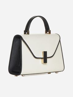 Valextra's Iside small bag in white and black textured leather featuring a top handle, detachable shoulder strap, flap with turn-lock fastening, protective feet, back flat pocket, inner flat pocket and gold-tone metal hardware. Composition: 100% calfskin Valextra Bag, Valextra Iside, Small Leather Bag, Sneaker Wedge, Bridal Shoes, Leather Accessories, Small Bag, Leather Handbag, Luxury Handbags