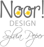 the logo for noor design, featuring yellow flowers and black lettering on a white background