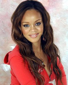 a beautiful young woman with long brown hair