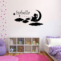 a child's bedroom with a wall decal that says i love you to the moon and back