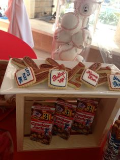 baseball themed cookies and snacks are on display