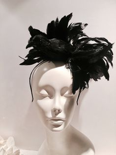 "Black Bird fascinator- Halloween- Feather Headband- Kentucky Derby- Ravens- Crow- Horse race- Mad Hatter Hello, I have one made so it can ship within a day or two. This fascinator is perfect to add whimsy and is just so fun you'll be the life of the party. A great conversation piece Most people while talking to you don't notice the bird at first and then all of a sudden they say,\" oh my God you have a bird on your head !\" This black feather fascinator has a black feather bird with a puff of b Black Bird Costume Women, Black Structured Crown Costume Hat For Party, Black Costume Hat With Structured Crown For Party, Whimsical Halloween Party Hat, Black Fascinator For Halloween Party, Carnival Evening Headband Costume Accessory, Carnival Evening Costume Headband, Adjustable Evening Hair Accessories For Carnival, Adjustable Hair Accessories For Evening Carnival