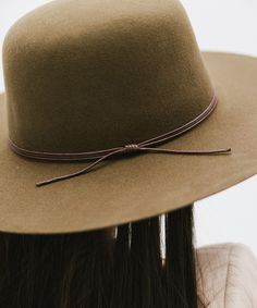 Rue is a sophisticated, classic open crown shape with a structured semi-wide brim. This is the only hat featuring hand-stitched detailing on the brim's edge for a subtle, distinctive touch. Included is a tonal triple-strand waxed leather band that is both adjustable + removable for styling. Classic Wide Brim Felt Hat For Everyday, Classic Adjustable Cloche Hat With Curved Brim, Classic Spring Felt Hat For Rodeo, Classic Wide Brim Boater Hat For Fall, Fall Flat Brim Sun Hat, Fall Sun Hat With Flat Brim, Classic Curved Brim Hat For Fall, Chic Curved Brim Hat For Rodeo, Classic Cloche Hat With Curved Brim For Fall