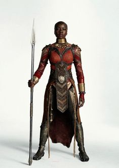 Dora Milaje Concept Art, Women Worrior Outfits, Wakanda Spear, Wakanda Warriors, African Warrior Women, Okoye Black Panther, Wakanda Fashion, Okoye Marvel, Black Boys Haircuts