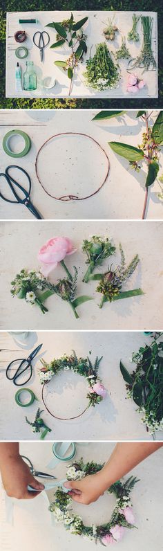 flowers are being made with scissors and tape on a table in the process of making wreaths