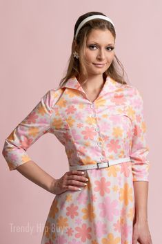 • Embrace timeless elegance with our Vintage Style Dress, evoking the charm of 50s and 60s Dress Style.• This Vintage Inspired Dress features a Pastel Orange, Pink Floral pattern, perfect for adding a touch of vintage flair to your wardrobe.• Crafted from a cotton-like polyester blend, this A-line Dress offers both comfort and style, ideal for all-day wear.• With a wing collar neckline and 3/4 sleeves, this Vintage Shirt Dress Style exudes sophistication, while the knee-length A-line skirt adds 1940s Fashion Dresses, Vintage Inspired Shoes, 1950s Fashion Dresses, Vintage Style Hat, Vintage Shirt Dress, Wing Collar, Pastel Orange, 1990s Fashion, Pin Up Dresses