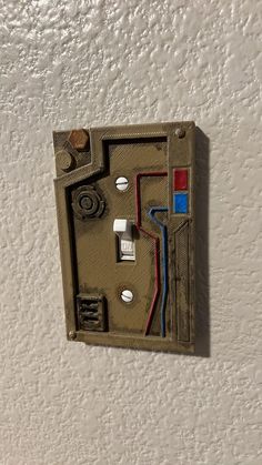 an electrical outlet on the wall with wires