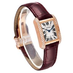 Cartier Tank Anglaise Rose Gold Silver Dial Diamond Ladies Watch WT100013. Quartz movement. 18K rose gold case 30.2 x 22.7 mm. Circular grained crown set with the diamond. Original Cartier factory diamond bezel. Scratch resistant sapphire crystal. Flinque and silvered dial with black roman numerals. Sword shaped blued steel hands. Secret Cartier signature at X. Custom burgundy leather strap with Cartier 18K rose gold deployant buckle. Luxury Cartier Diamond Watch For Anniversary, Luxury Diamond Watch With Chronometer, Luxury Watch Bands With Polished Finish For Anniversary, Luxury Polished Watches For Anniversary, Luxury Polished Finish Watches For Anniversary, Luxury Polished Anniversary Watches, Classic Rose Gold Diamond Watch With Polished Finish, Luxury Polished Finish Anniversary Watches, Formal Rose Gold Jewelry And Watches With Metal Dial