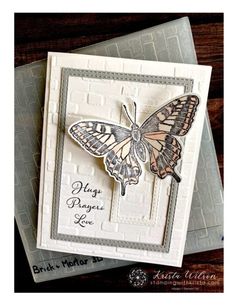 a close up of a card with a butterfly on it