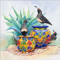 three birds sitting on top of colorful vases