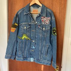 Adorable Brand New Jacket That I Sewed Onto. Patches/Back Piece With All Different Fabrics And Textures. This Is On A Brand New Levi’s Jacket. Women’s Oversized Boxy Fit. Size M One Of A Kind! Maybe This A Jungle Love Vibe With The Patches. Laying Flat Measures Pit To Pit 23” Length 27.5” Levis Jacket Patch, Patch Denim Jacket, Jungle Love, Patch Denim, Denim Jacket Patches, New Jacket, Levis Jacket, Denim Patches, Jacket Women